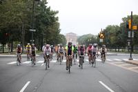 Bikers cruise down the Benjamin Franklin Parkway.